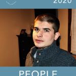 A young man with short dark hair wearing a gray sweater looks at the camera. The image is the cover of the People Incorporated Annual Report 2020, with a blue border and white text.