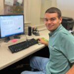 Samuel at the desk