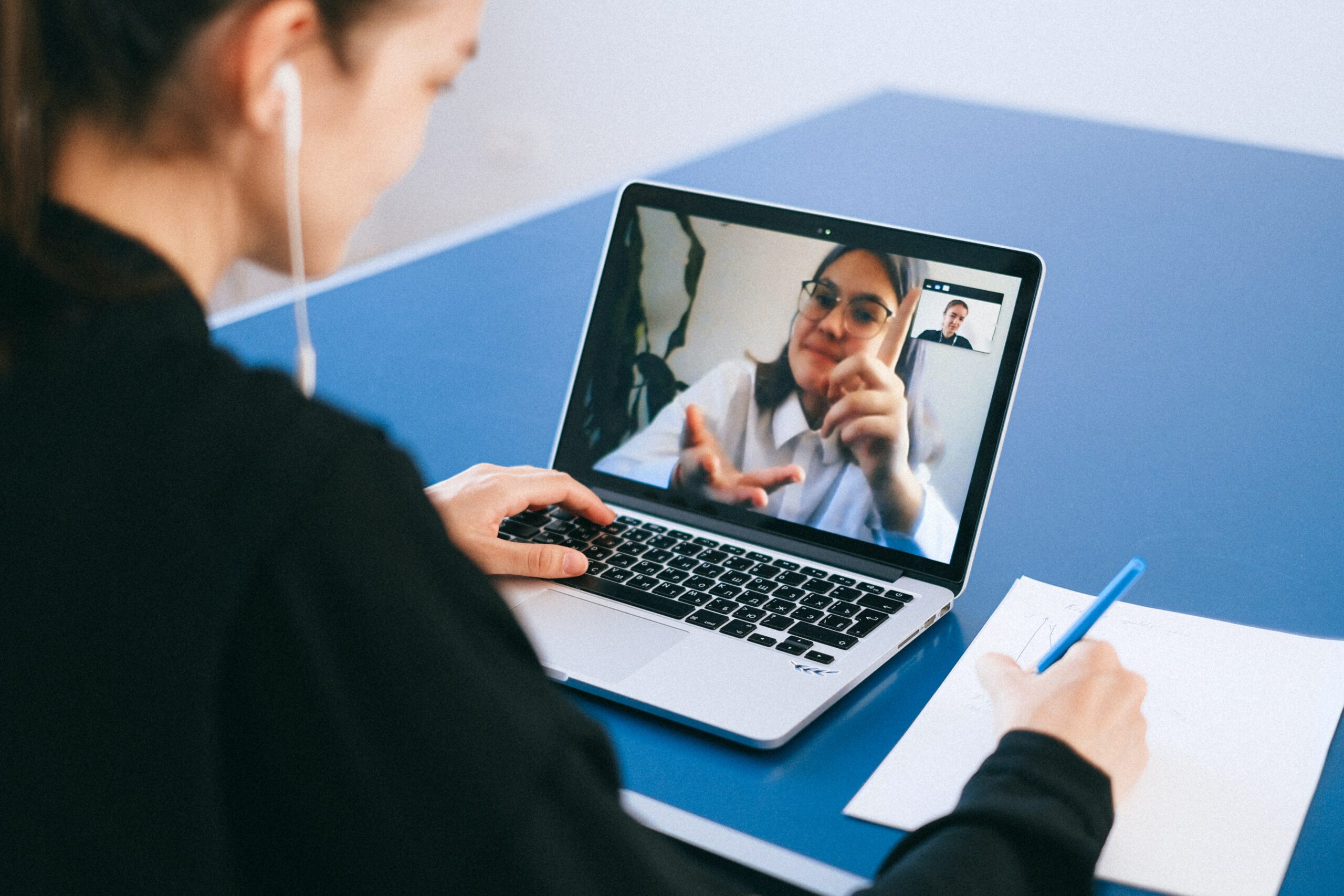 Woman conducting a job interview on a video call.